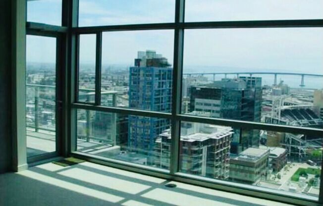 Luxurious 2 Bedroom / 2 Bath 25th story condo with 2 parking spaces***Unbelievable Views of Petco Park***