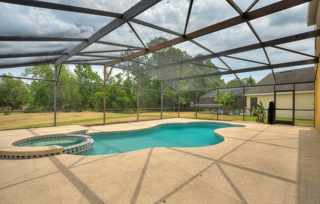 Contemporary Single-Family Home in a Gated Community! No Rear Neighbors! Pool and Lawn Care Included!