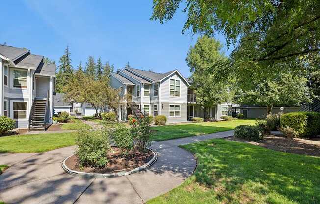A residential area with houses and a well-maintained garden.