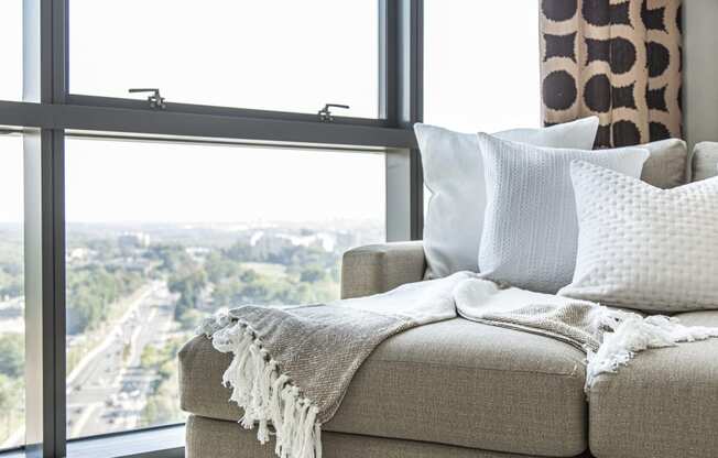 NoBe Market Apartments couch and city view