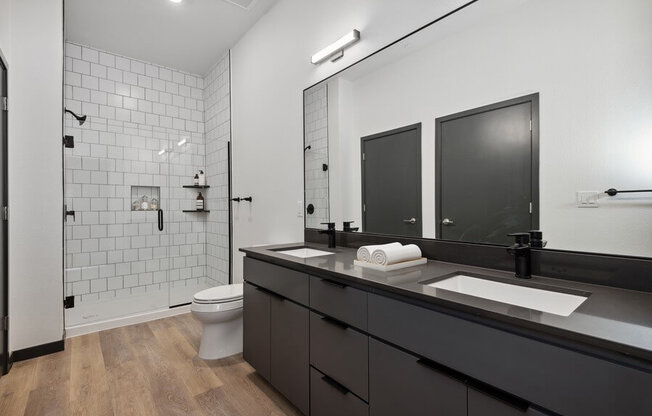 Model bathroom with dual vanity