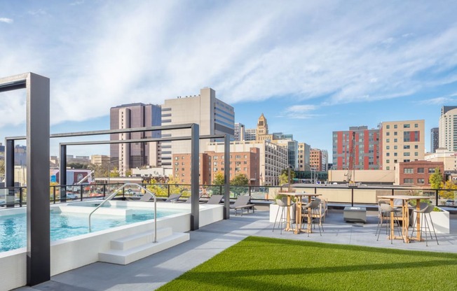 a field of grass in front of a building at Maven on Broadway, Rochester, Minnesota