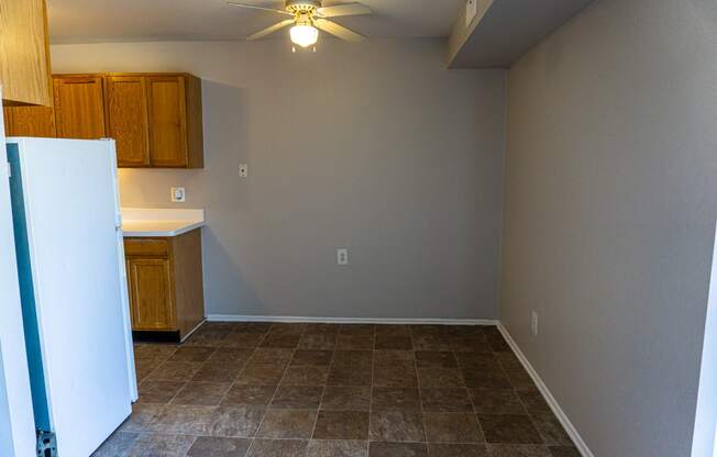 Spacious dining room and kitchen at Warren Woods Apartments in Warren, Michigan
