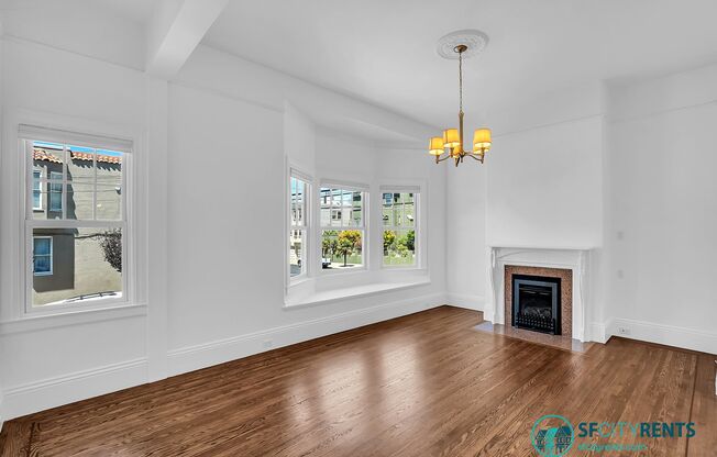 Mission: Bright Corner Condo with Garage Parking & W/D in-unit