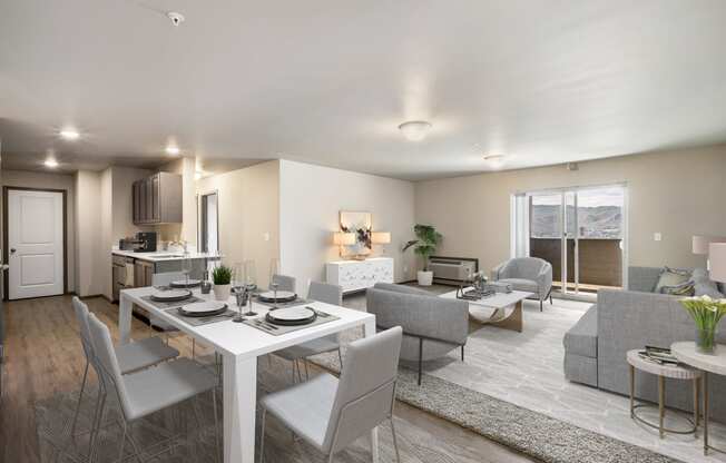 a living room and dining room with a white table and chairs  at Altitude, East Wenatchee, WA, 98802