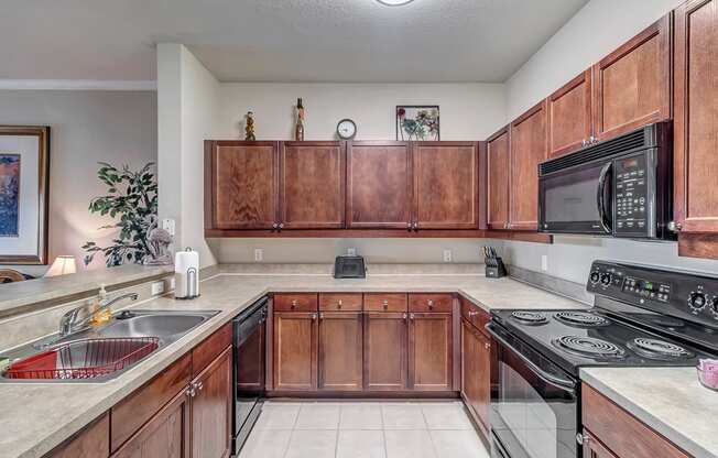 Large kitchen with double sinks at Bermuda Estates Apartments in Ormond Beach, FL