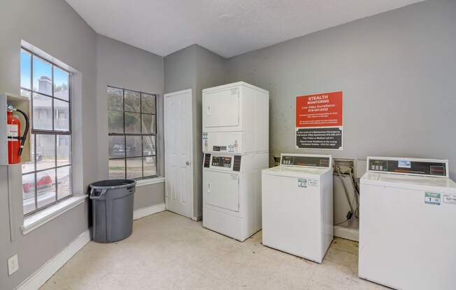 the preserve apartments dc laundry room with washer and dryer