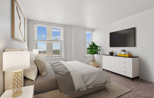 an image of a bedroom with a bed and a tv