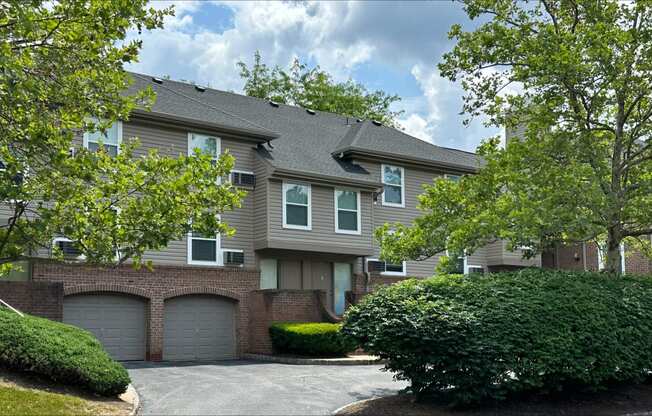 a large apartment complex with two garages