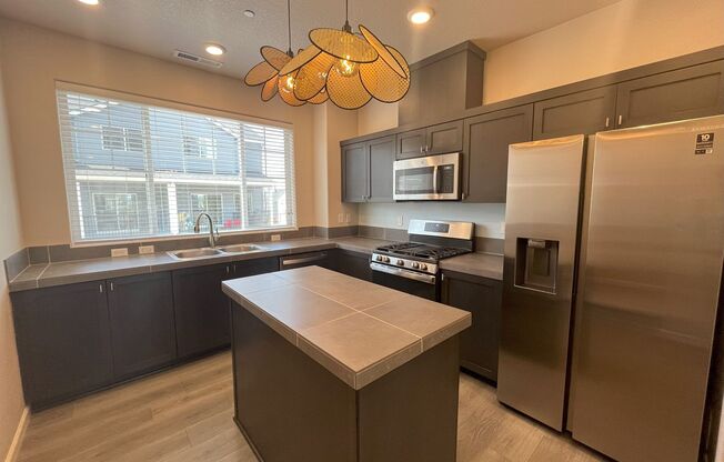 Your Modern Retreat with Open Living Spaces and Private Garage, across from park, Bethany Village area