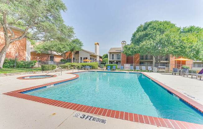 A large swimming pool with the depth marked 3FT at Copper Hill Apartments, Bedford, Texas