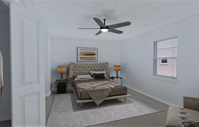 a bedroom with a bed and a ceiling fan