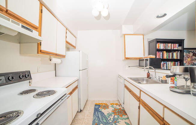 Fully Equipped Kitchen at Cambridge Club Apartments in Ann Arbor, Michigan