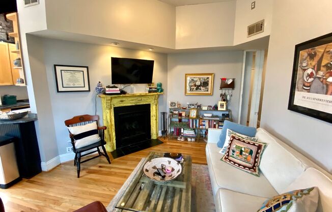 Top floor 1 bedroom in DuPont with Balcony, Fireplace and W/D!