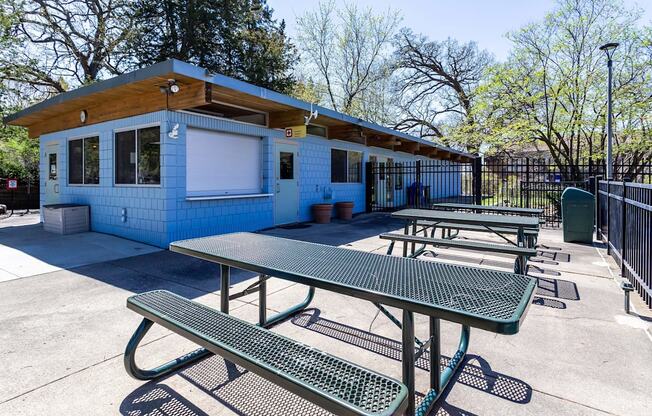 our picnic tables are conveniently located in front of the building  at ReNew at Neill Lake, Eden Prairie, Minnesota