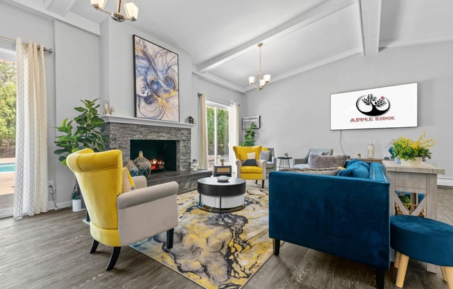 a living room with a fireplace and yellow and blue furniture