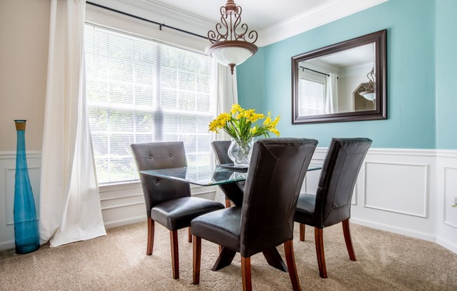 Dining table and chair at Wynnewood Farms Apartments, Overland Park