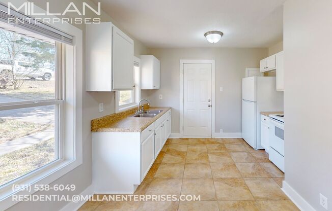 Charming Renovated Home with Spacious Yard and Bright Living Spaces