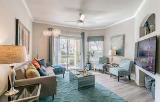 Spacious Living Room With Private Balcony at Portofino Apartment Homes, Tampa, FL, 33647-3412