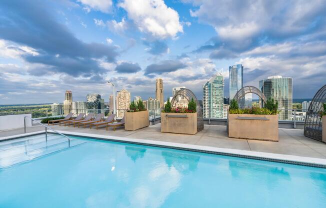 Take in sweeping Atlanta skyline views from the rooftop pool at Modera Old Ivy, where elevated design and open-air lounging define the day.
