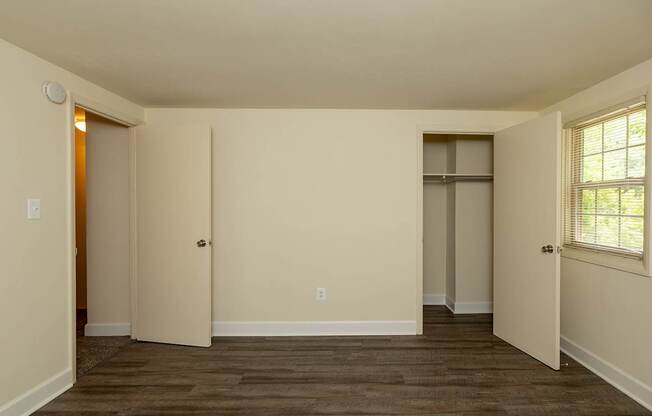 A room with a door and a window.