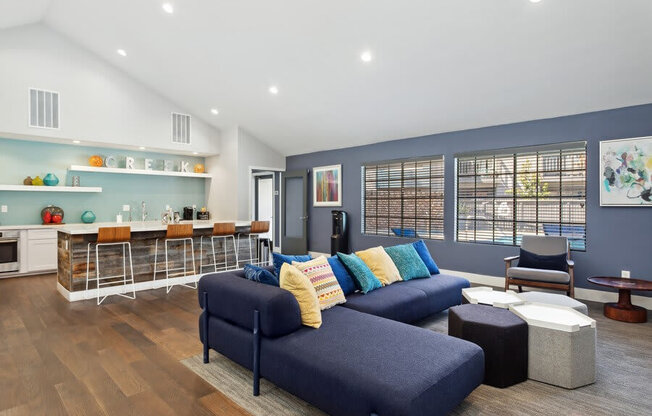 Community Clubhouse with Island Bar and Lounge Furniture at Creek 2645 Apartments in Sacramento, CA.