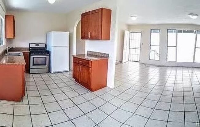 Spacious 4-bedroom, 1-bathroom apartment with 2 assigned tandem parking stalls.