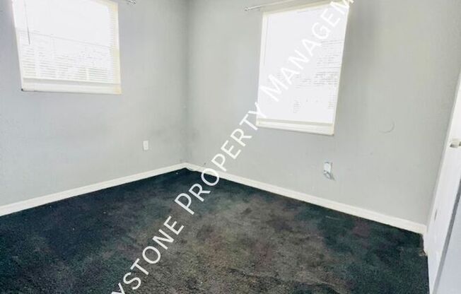 1409 E 108 AVE