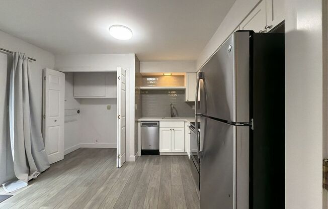 Remodeled 2 Bedroom Duplex Near Division Street with Fenced Patio, Parking & Updated Kitchen