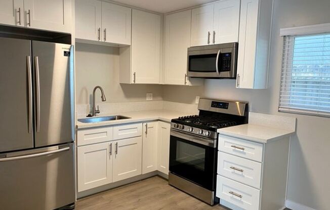 Charming 2 Bedroom in University Heights with Onsite Laundry ~Cats OK~