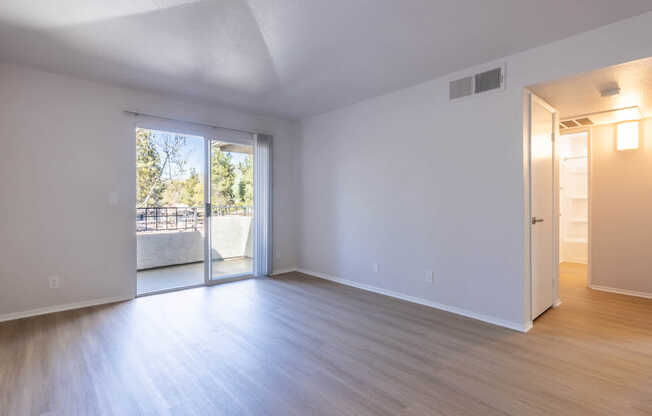 Living Room with Balcony and Hard Surface Flooring