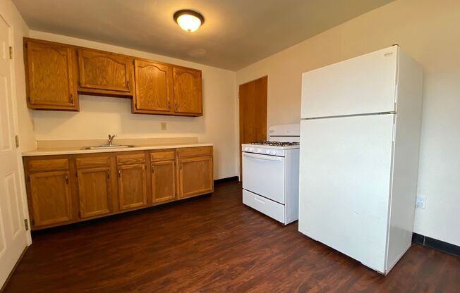 Cozy Two Bedroom Townhome with Central AC & Off-Street Parking! Call Today to Schedule a Tour!