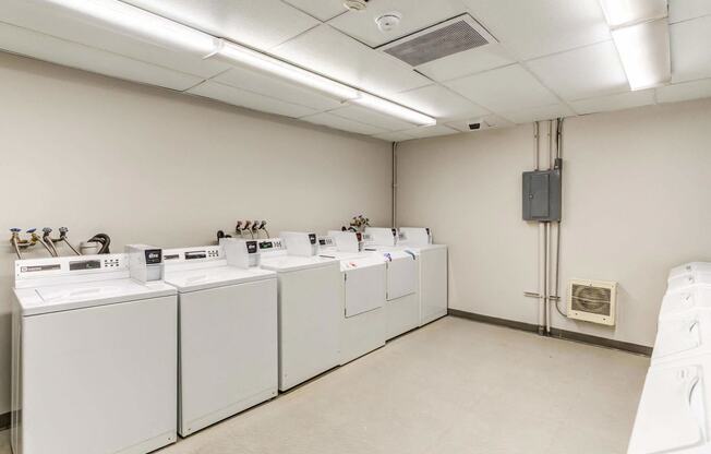 a large laundry room with washers and dryers  at ReNew at Neill Lake, Minnesota