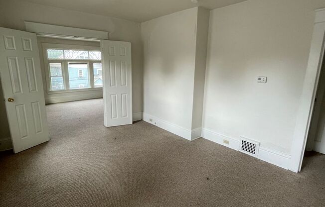 Clean 2BR up with offstreet parking and yard