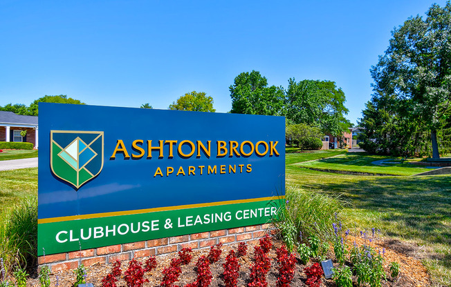 Sign for the clubhouse and leasing office at Ashton Brook Apartments, guiding residents to the community amenities.