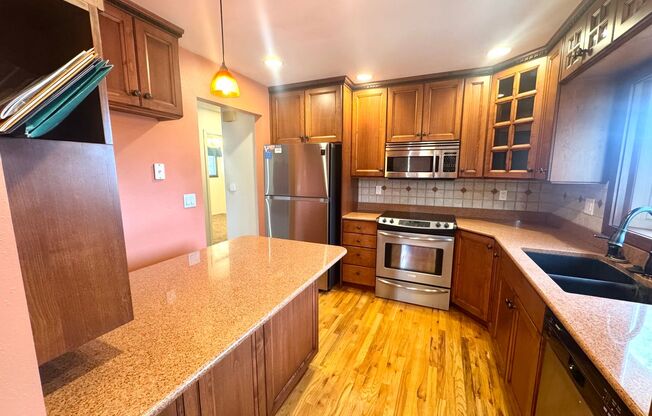 Spacious Eastside Home with Sunroom, EV Charging & Finished Basement!