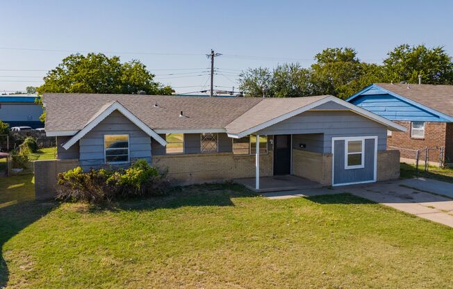 Beautifully Updated 4-Bedroom Home with Quartz Countertops and Spacious Backyard