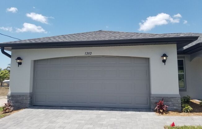 4 Bedrooms 2 Baths Single-Family Home in Cape Coral