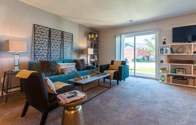Living Room With Balcony at Hamilton Square Apartments, Westfield, Indiana