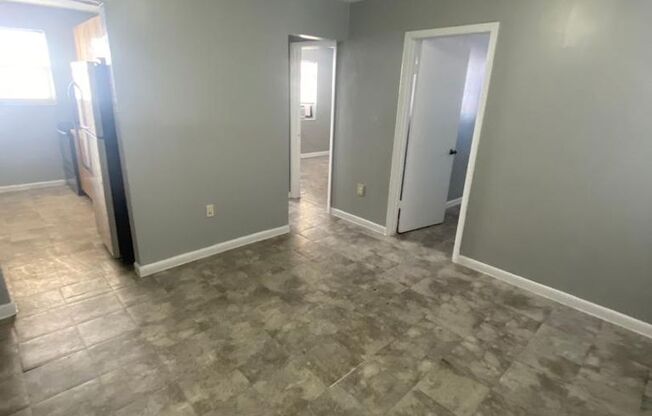 "Modern Comfort: Newly Updated 2BR/1BA, Vinyl Tile Flooring, Spacious Living, Near Downtown Miami!"