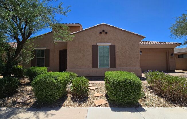 Highly sought after area in Goodyear!  With SOLAR and 3 car garage!