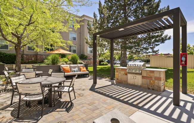 the reserve at bucklin hill patio with grill and seating area