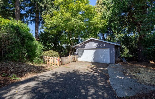 Spacious Home with Attached Garage, Expansive Deck, and Scenic Backyard!