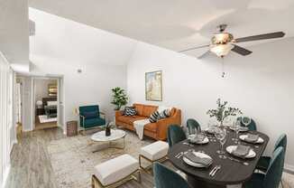 Hunters Pointe Apartments in Charlotte North Carolina photo of a living room and dining room with a ceiling fan and hardwood floors