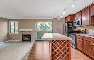 Kitchen and Living Room at Whispering Brook Apartments, Des Moines,98198