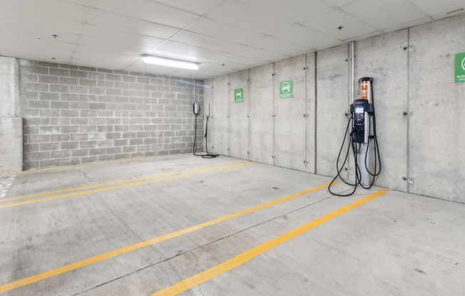 a gas station in a parking garage with a gas pump at Bakery Living, Pittsburgh, PA