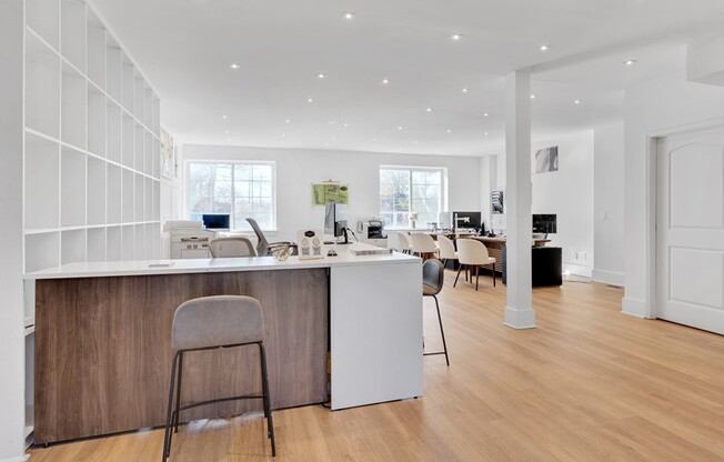 Elevate your work-life balance in the spacious co-working area at Icon Downtown Durham. Enjoy modern design, ample light, and connectivity that fosters productivity. Explore your ideal workspace today!