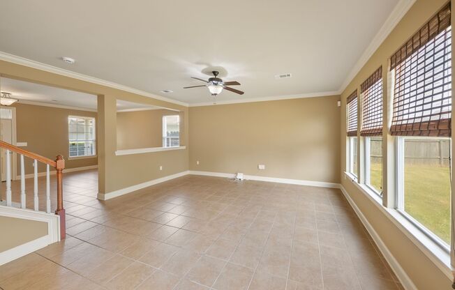 3 Bedroom home with a Bonus area! Sits on a Lake with a fenced yard!