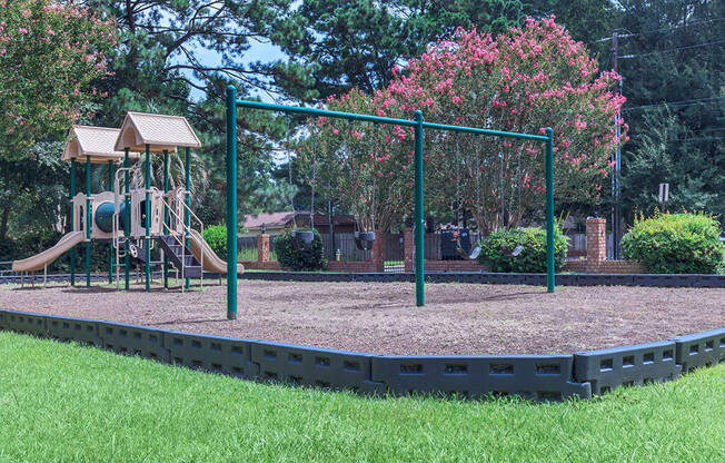 The Jaunt Apartments in Charleston South Carolina photo of a playground with a slide and monkey bars