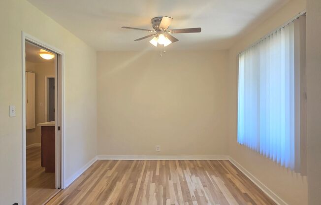 Cute Single Family Home with Large Bonus Room, Updated Kitchen, Wood Floors, Fresh Paint, Nice Yard!